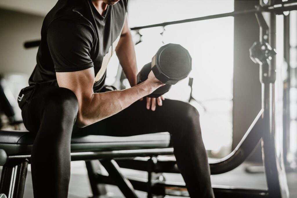 a person working out with a dumbell