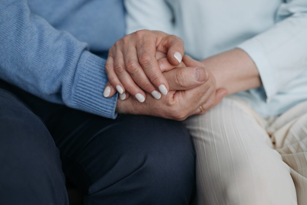 two people holding hands