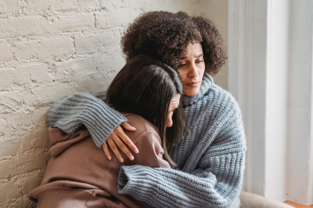 women hugging