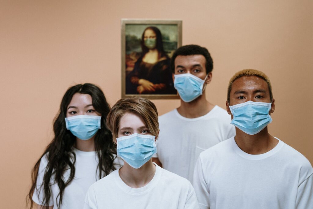 people wearing surgical face masks